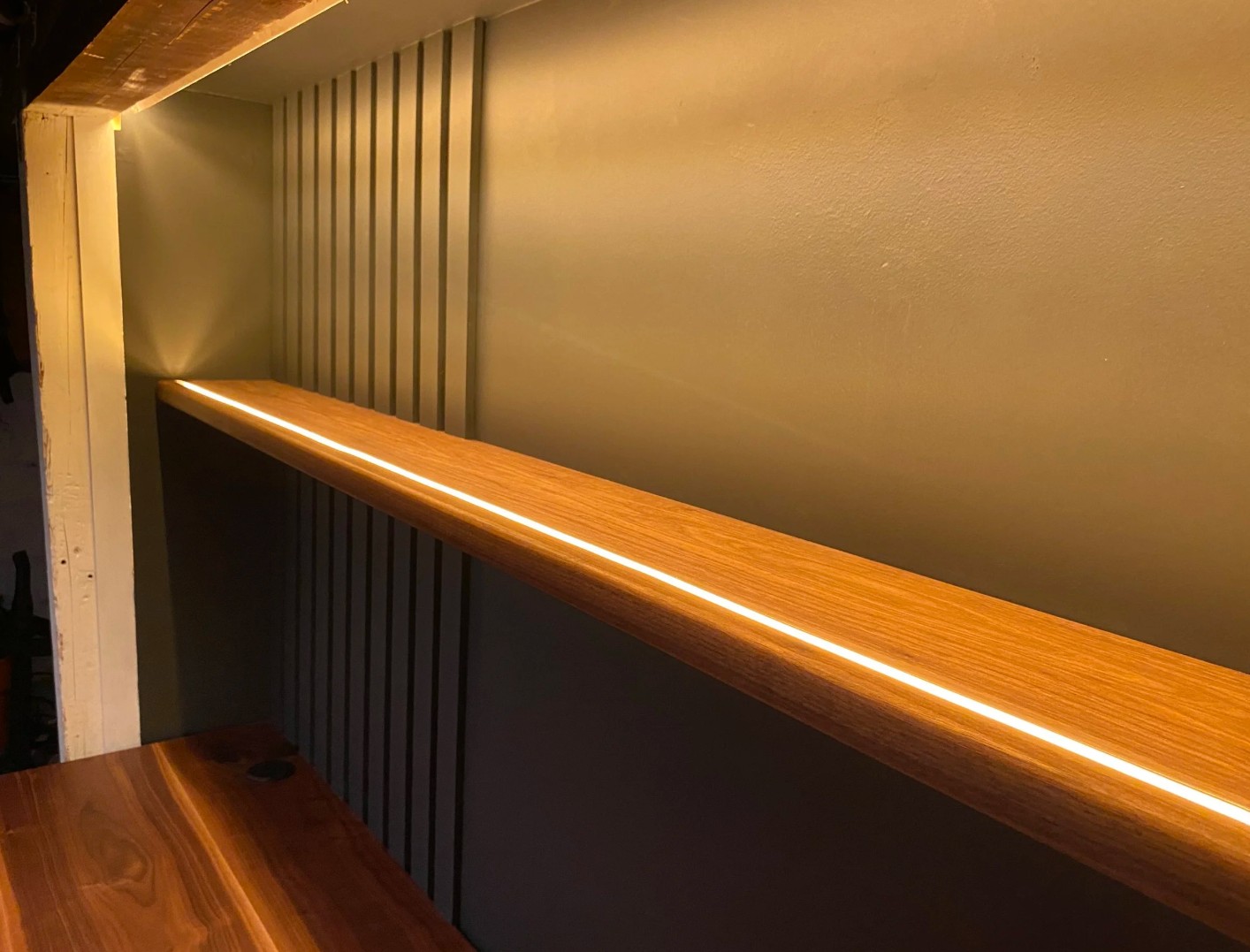 Custom wood shelf with LED lighting detail